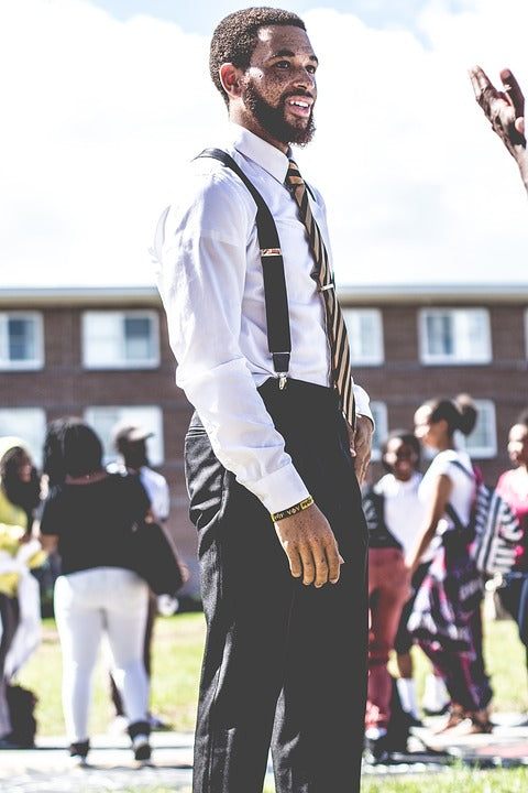 Black dress shirt store with white suspenders